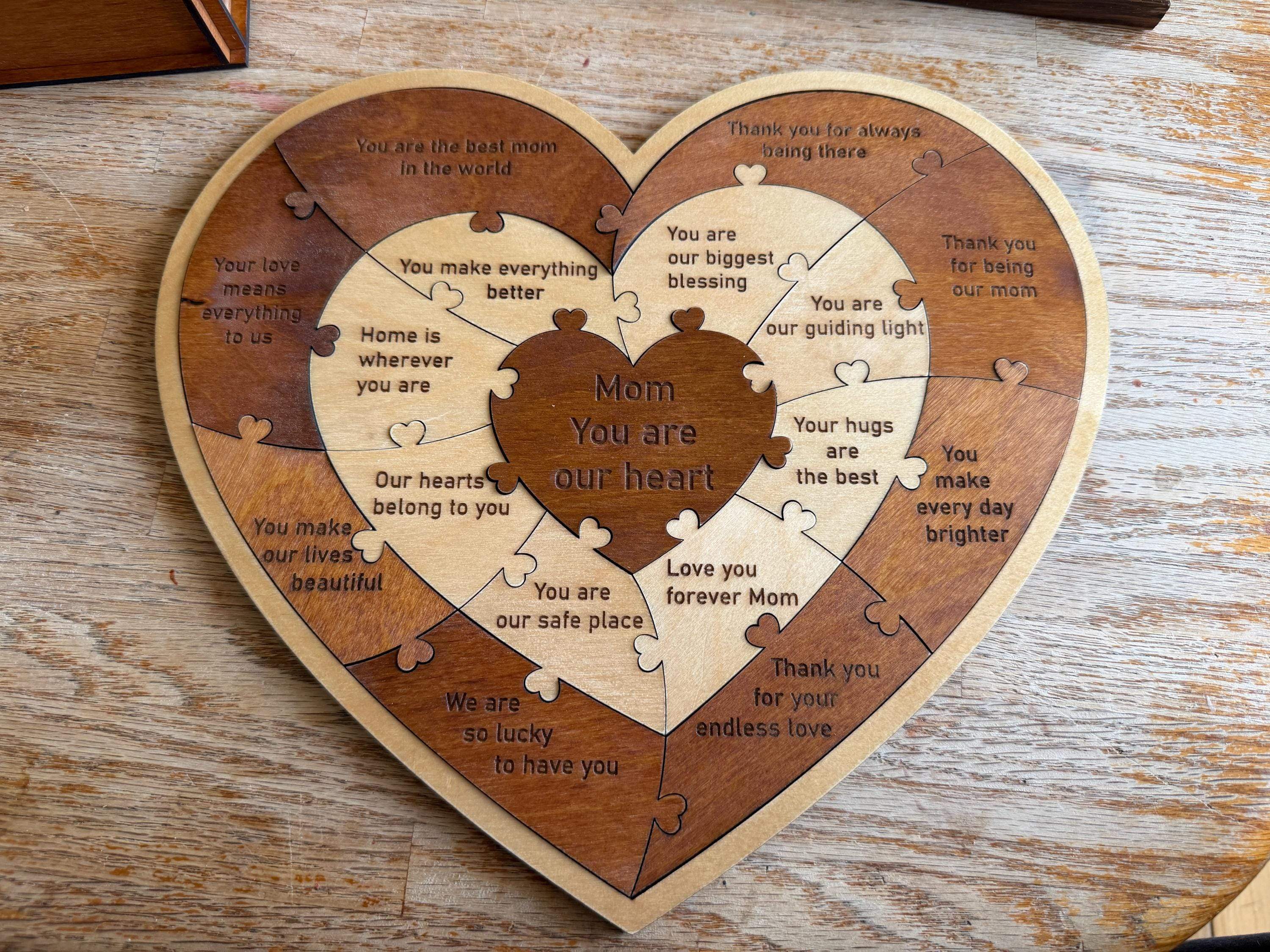 Handcrafted wooden heart puzzle with laser-cut mom quotes, layered wood art for Mother's Day gift