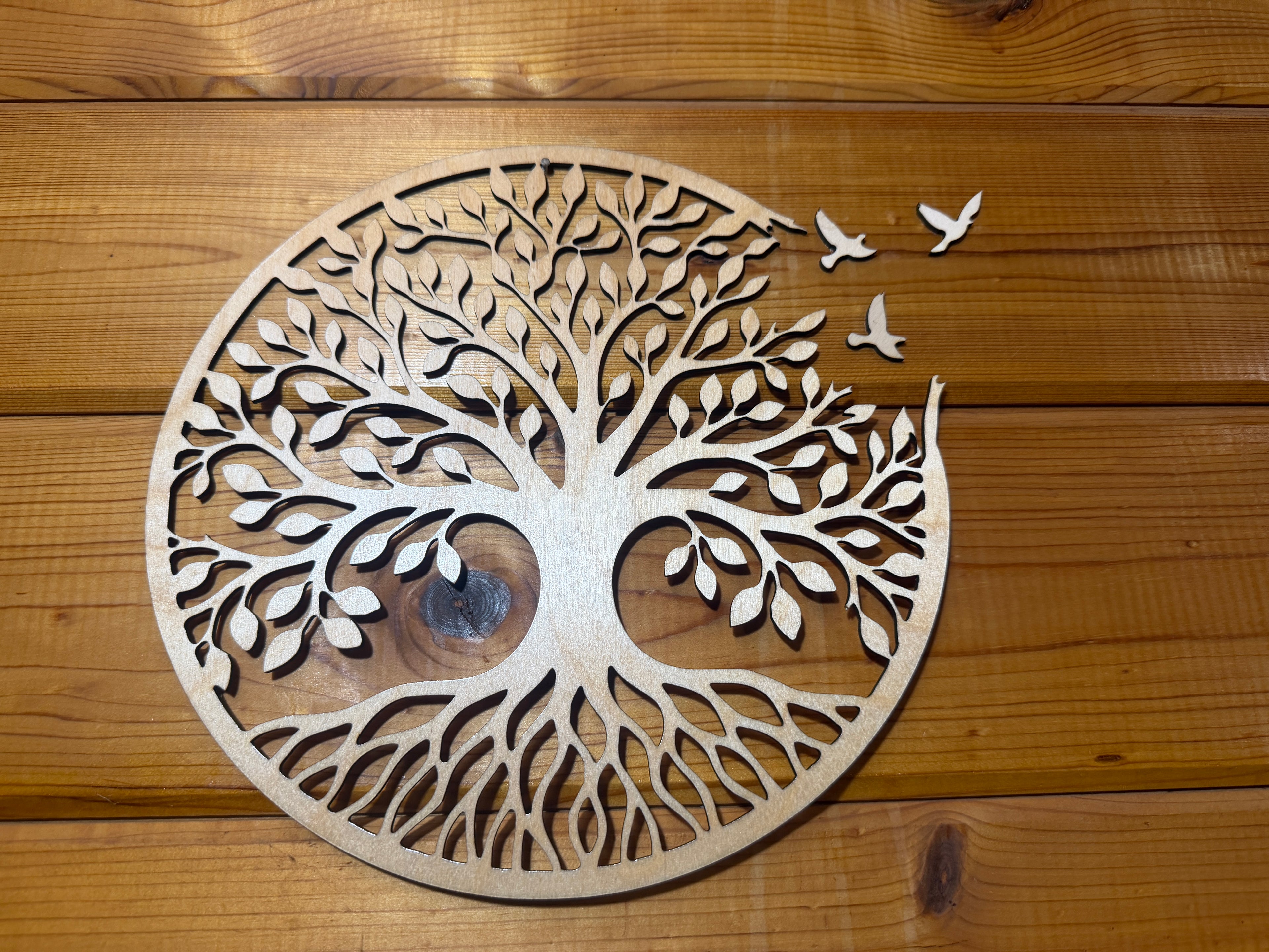Laser-cut wooden tree of life wall art with flying birds, rustic decor
