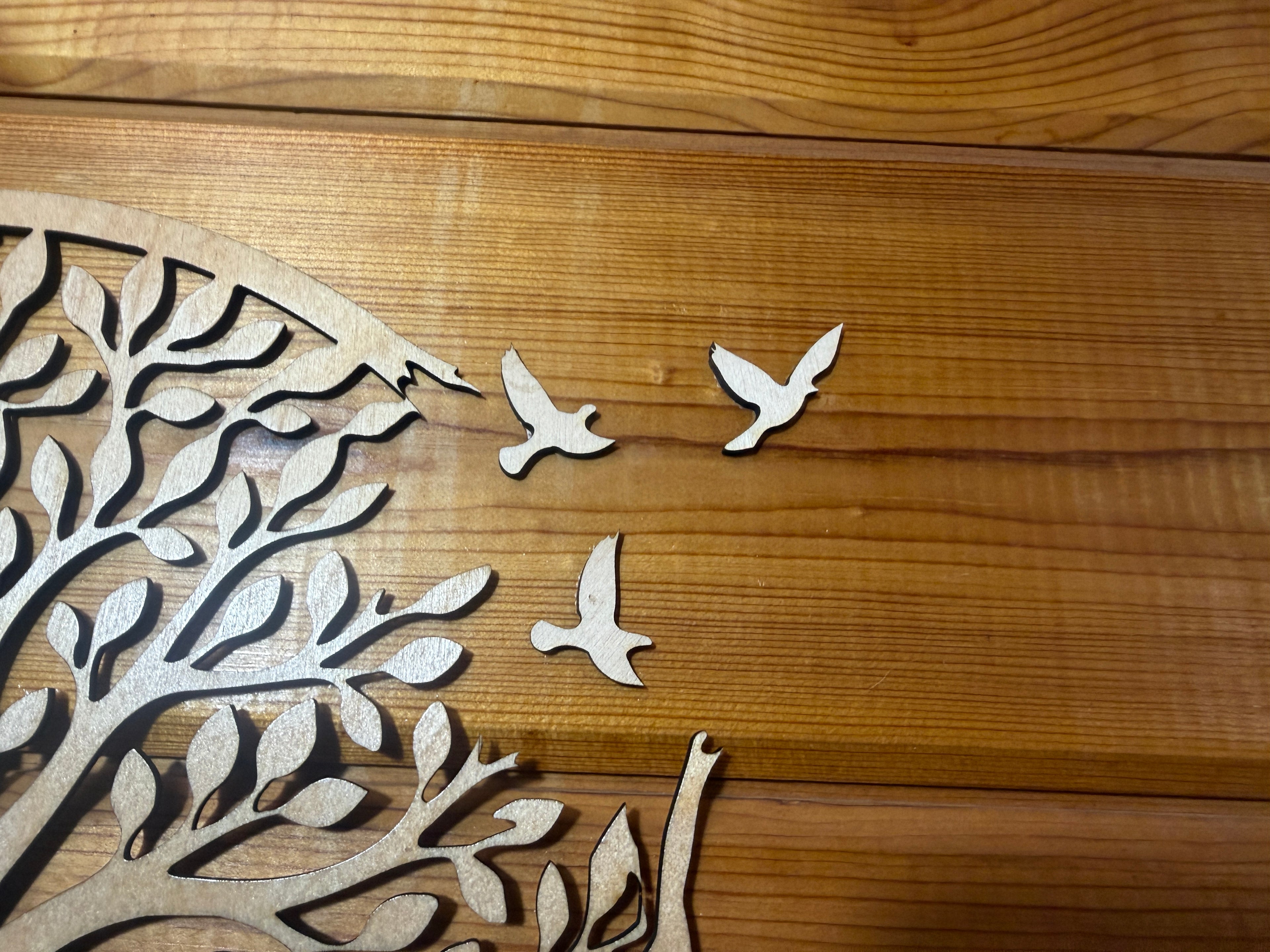 Laser-cut wooden tree with flying birds, rustic decor
