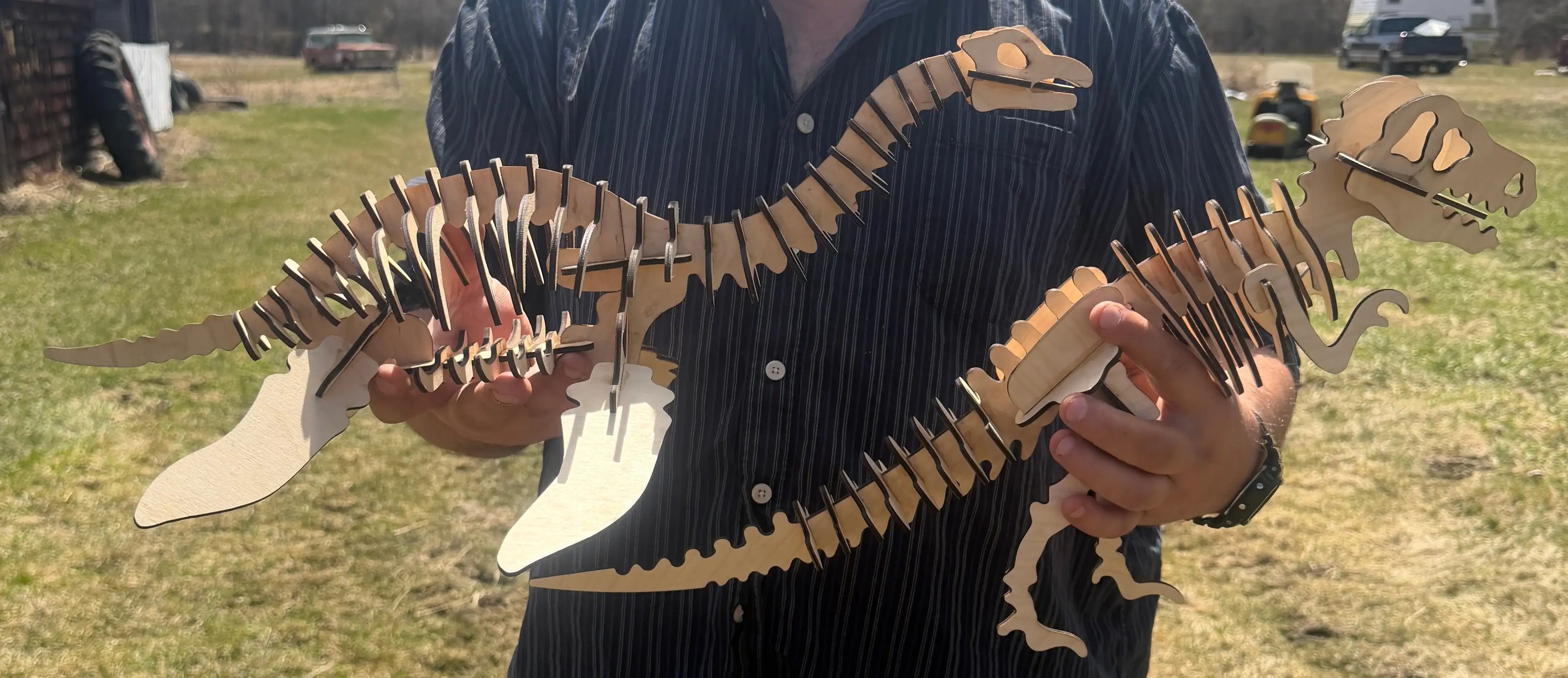 Handcrafted wooden dinosaur skeleton art, laser-cut layered wood design for unique home decor