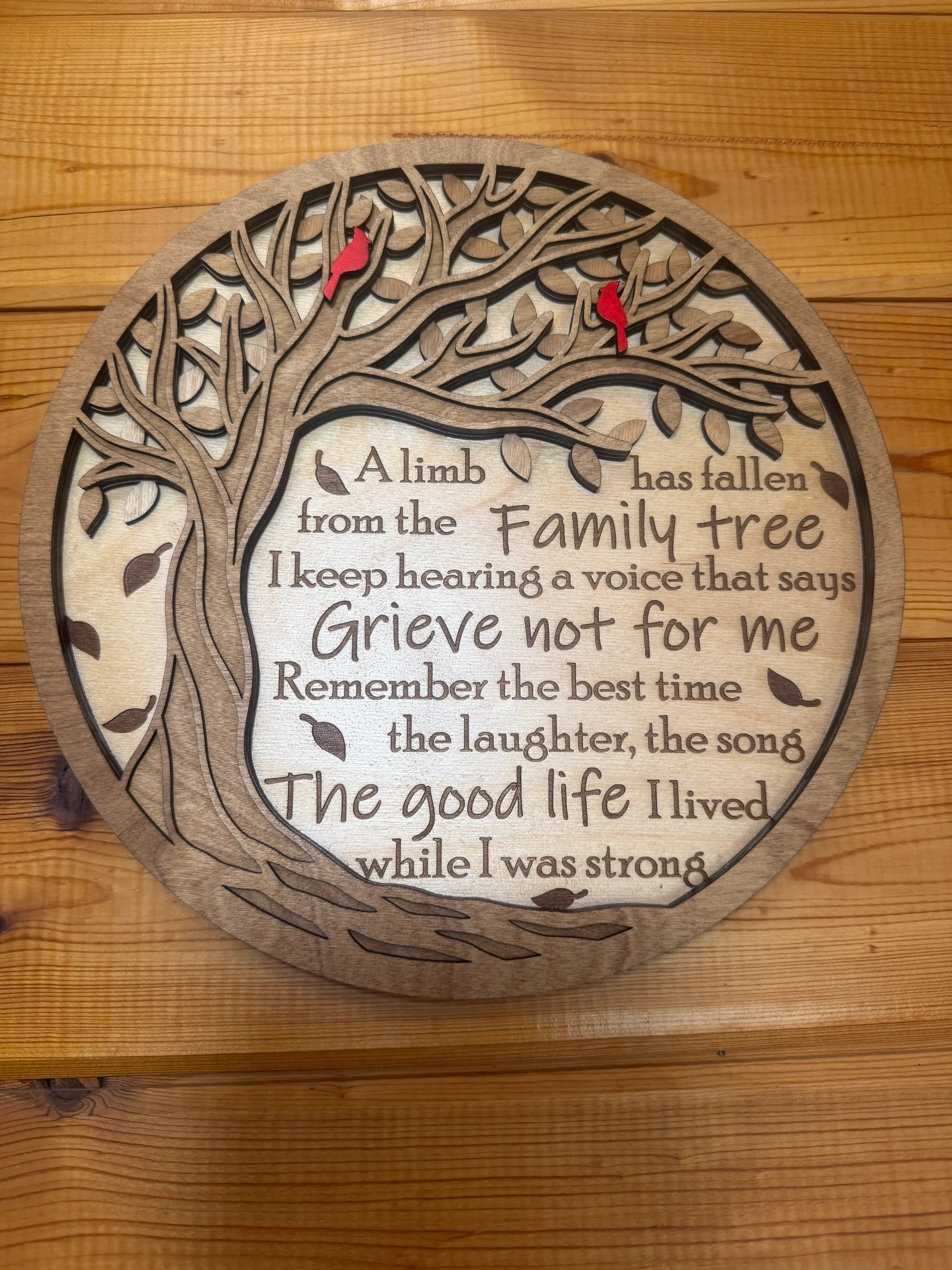 Layered wood family tree art with red birds and heartfelt memorial quote, handcrafted decor