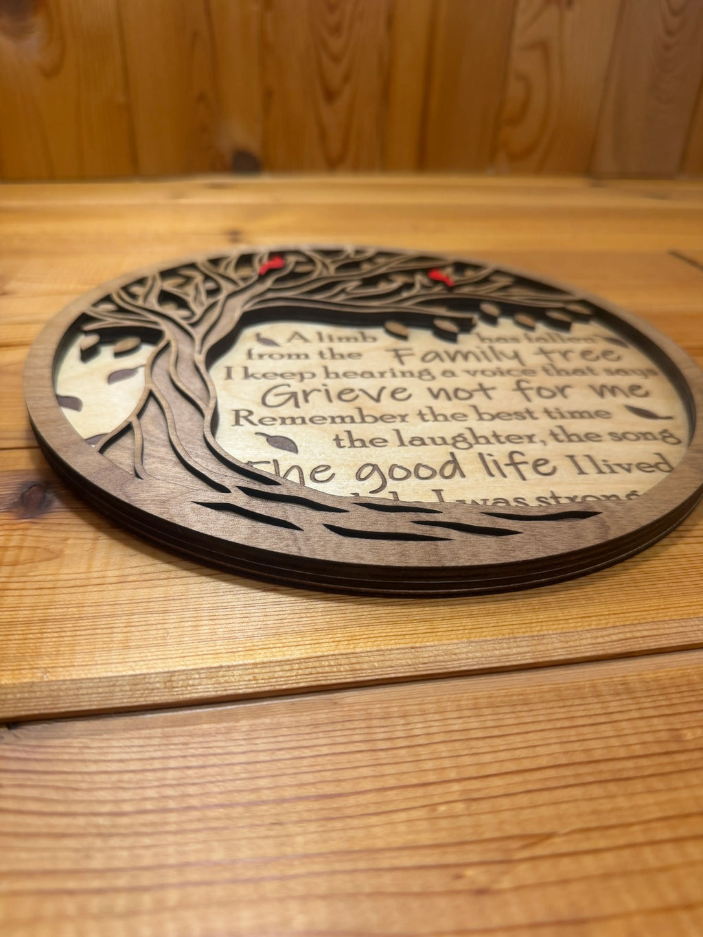 Layered wood art with family tree design and inspirational quote, handcrafted decor
