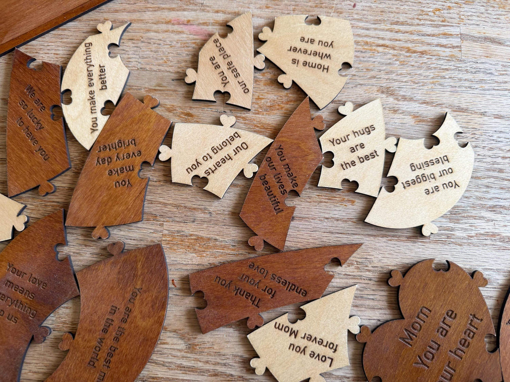Handcrafted wooden puzzle pieces with heartfelt messages, perfect for unique home decor or gifts.