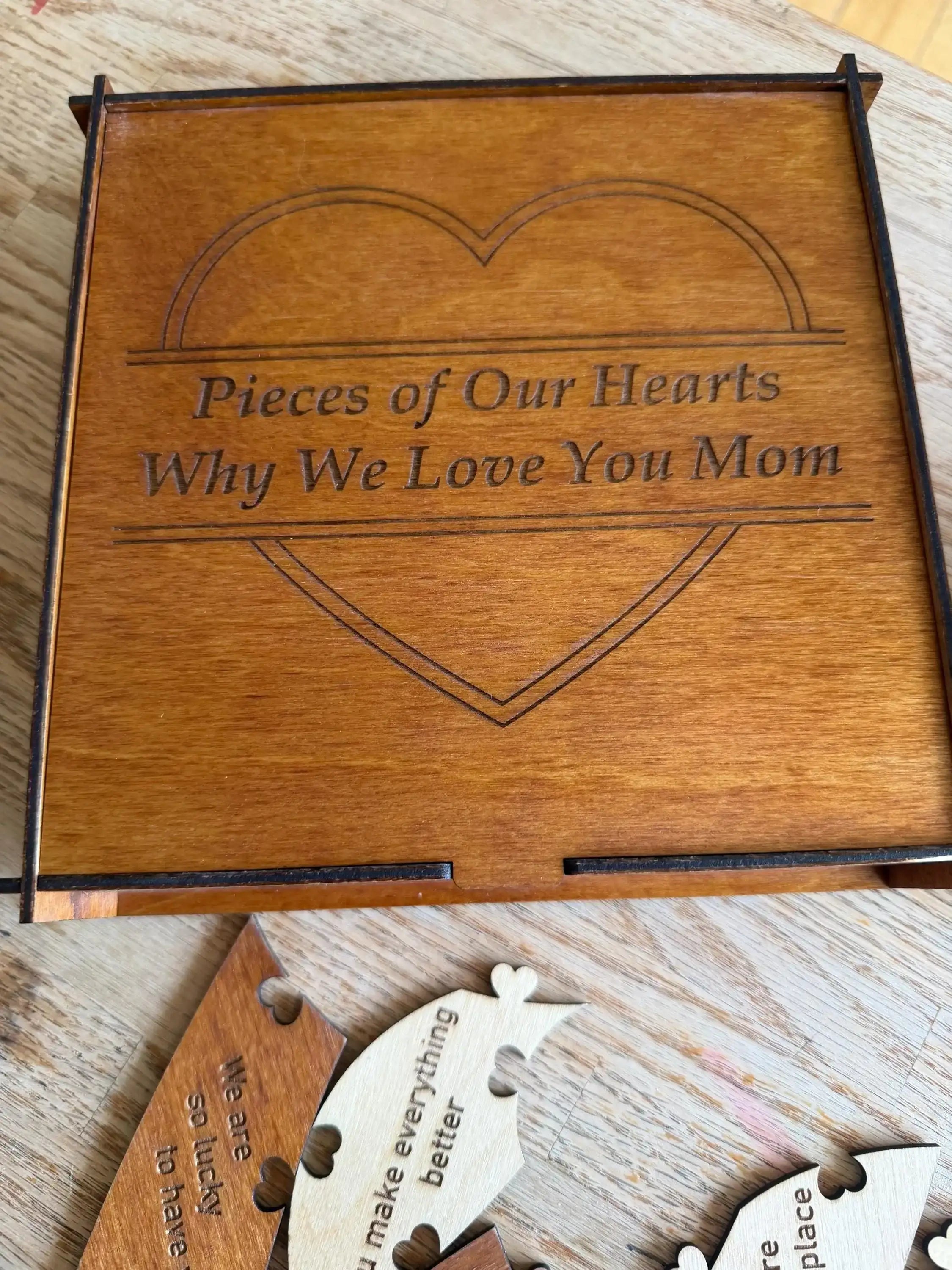 Engraved wooden heart puzzle, 'Pieces of Our Hearts Why We Love You Mom,' custom laser-cut decor