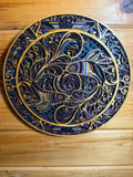 Layered wood mandala wall art with intricate blue, purple, and gold laser-cut swirls on rustic wood background